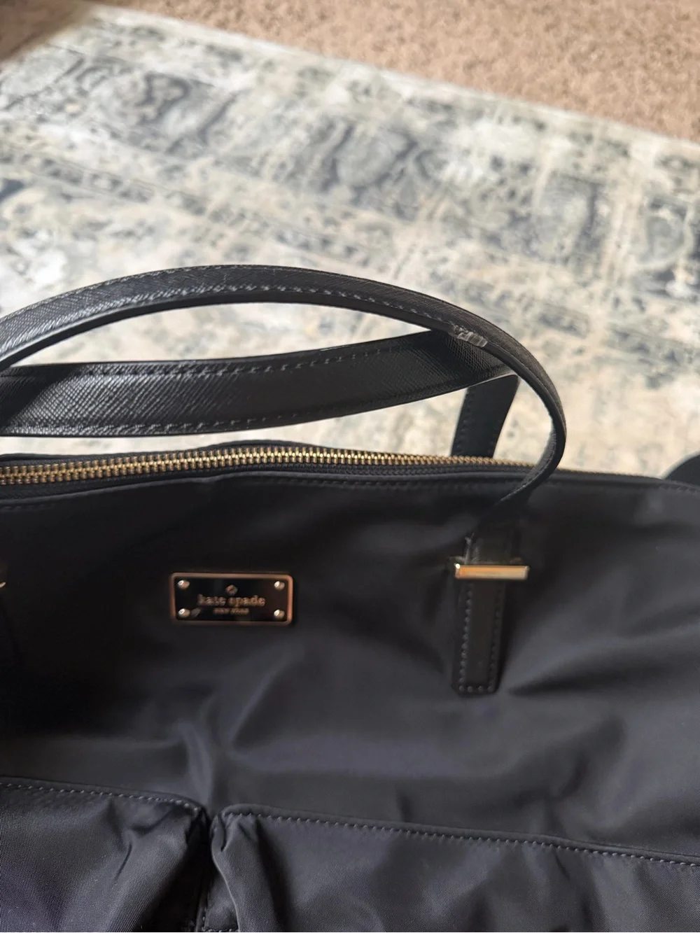kate spade black nylon duffel with gold hardware